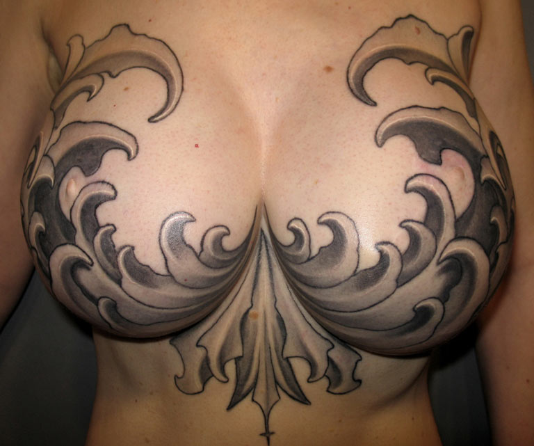 Sexy nude breast tattoos